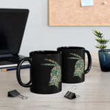 A Turquoise and Gold Mayan Warrior Face Black Mug